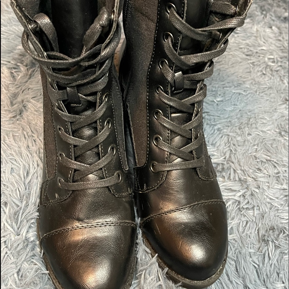 XOXO tipper side, lace up, black heeled boot.